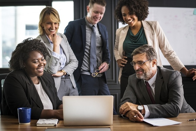 Business Sales Meeting With Diverse Group Of People