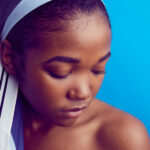 Dark skinned girl with headscarf