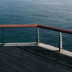 Cable Railing: Weighing the Pros Against the Cons #beverlyhills #beverlyhillsmagazine #prosofcablerailings #woodenrailings #cablerailing