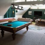 Creating a Luxury Game Room: 7 Clever Tips #beverlyhills #beverlyhillsmagazine #bevhillsmag #luxurygameroom #gameroom #gameplayexperience #bestscreen