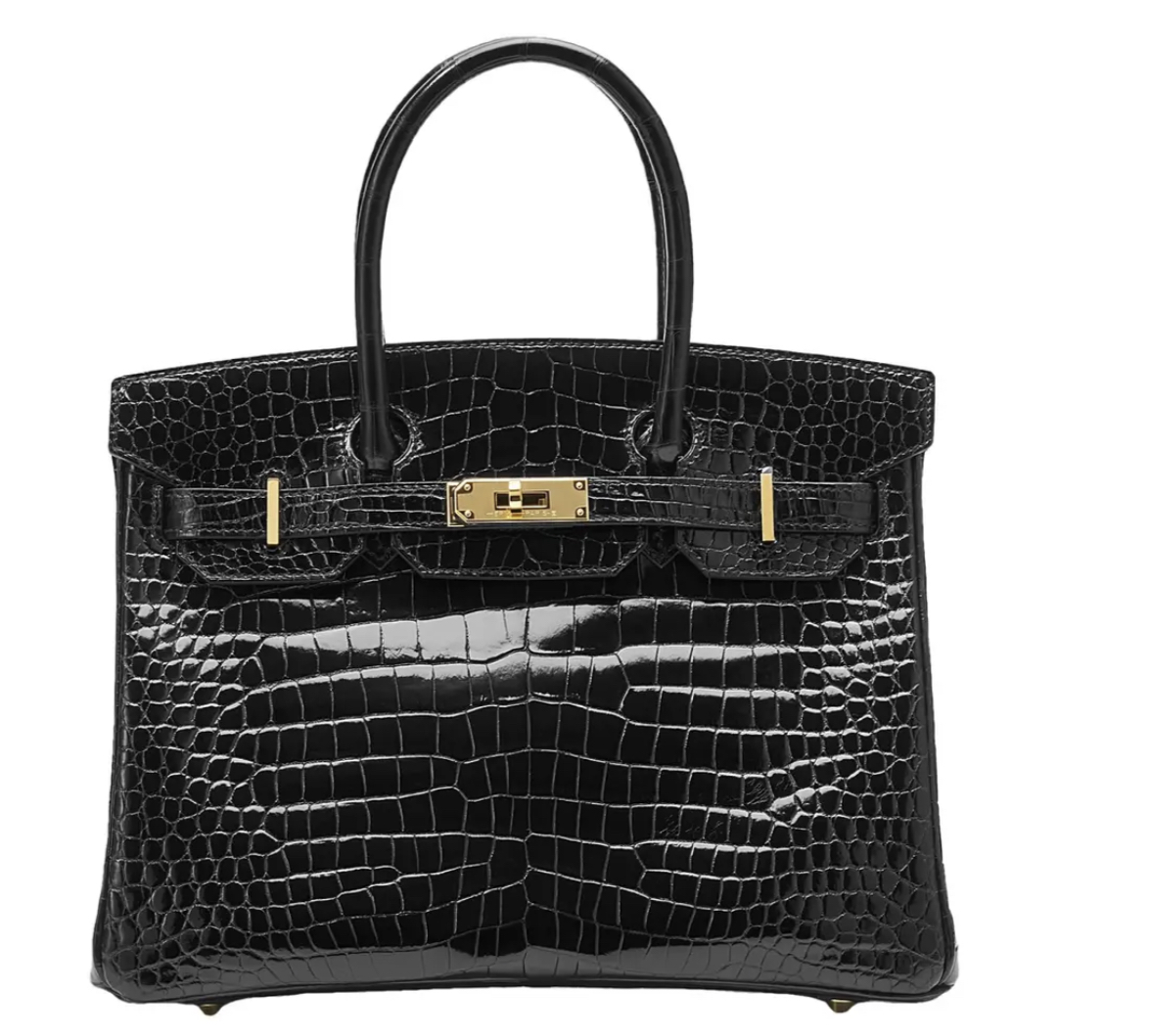 Hermès Crocodile Black Handbag. Buy Now!!! #bevhillsmag #beverlyhills #beverlyhillsmagazine #hermes #hermescrocodilehandbag #handbag #hermesblackhandbag #blackhandbag #ladieshandbag #blackbag #hermescrocodilehandbag