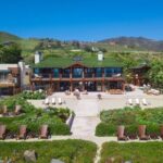 Pierce Brosnan’s Malibu Beach Orchid House: #beverlyhills #beverlyhillsmagazine #bevhillsmag #piercebrosnan #malibu #malibuhome #malibubeachorchidhome #luxuryhomes #hollywood #vacationhomes #orchidhouse