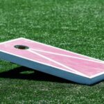 Top 6 Most Popular Cornhole Board Designs #beverlyhills #beverlyhillsmagazine #woodyboards #chevronpatterns #epoxyresin #epoxycoating #cornholeboarddesigns