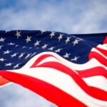 What Flag Can Fly On The Same Pole As The American Flag? #beverlyhills #beverlyhillsmagazine #bevhillsmag #americanflag #U.Sflag #traditionalflagpole #corporateflag