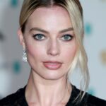 Hollywood Spotlight: Margot Robbie #MargotRobbie, #HollywoodStar, #BarbieMovie, #HarleyQuinn, #LuckyChap, #FilmProducer, #OscarNominee, #UpcomingFilms, #CharityWork, #Philanthropy