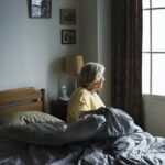 Senior Women in bed At Senior Living Home Care