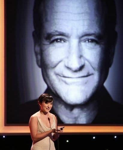 Zelda Williams accepts award on behalf of her Dad at the Noble Awards in Beverly Hills.